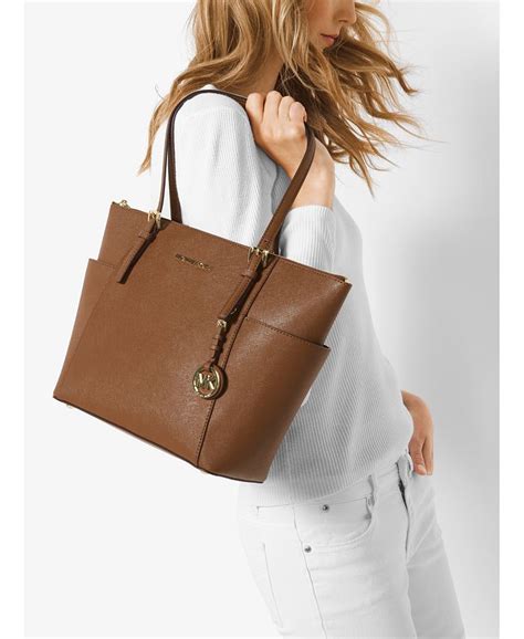 michael kors jet set east west top zip tote|michael kors carryall.